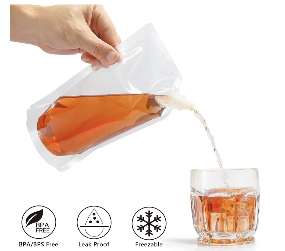 Pouring a drink from a flask into a glass